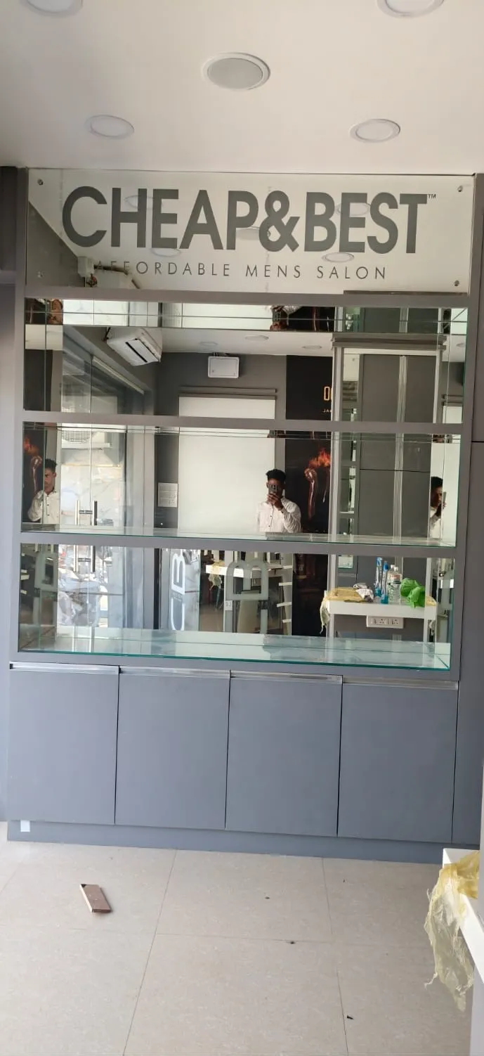 Custom glass display shelving for a retail salon in Bangalore