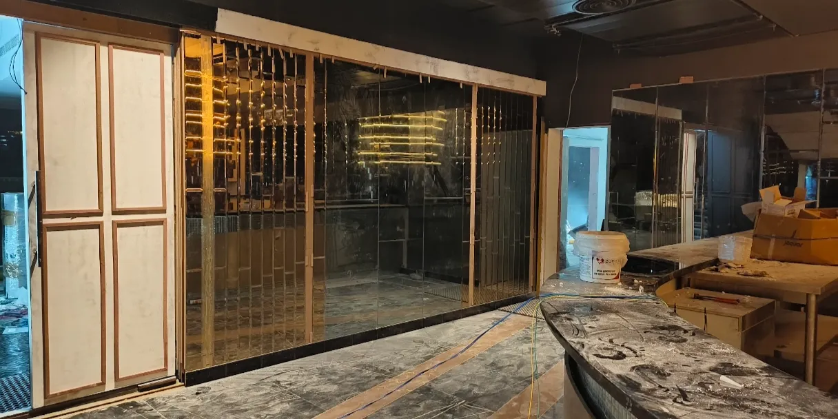 Decorative glass floor panel with patterned metalwork at night Bangalore