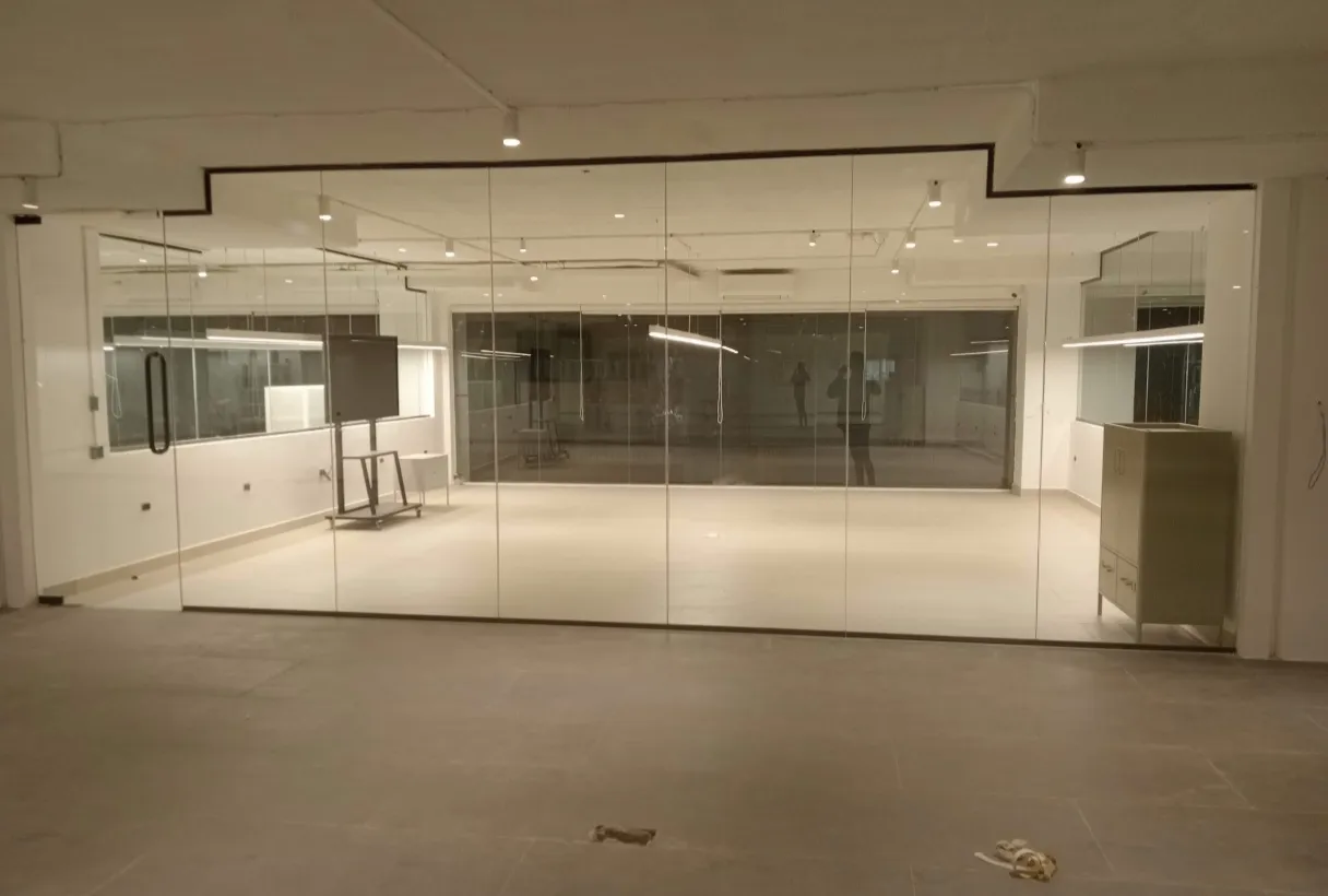 Glass shop front with sliding door for retail store in Bangalore