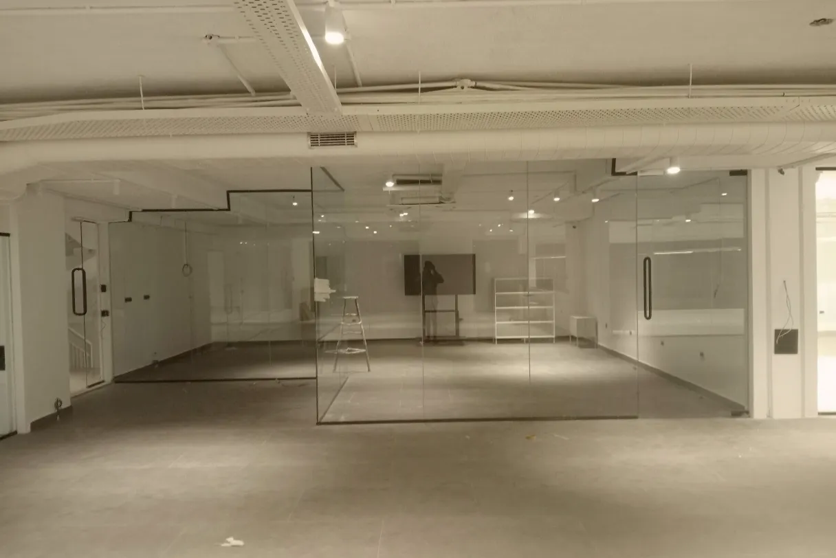 Large frameless glass office partitions for corporate office in Bangalore by Fashion Elite Glass Works